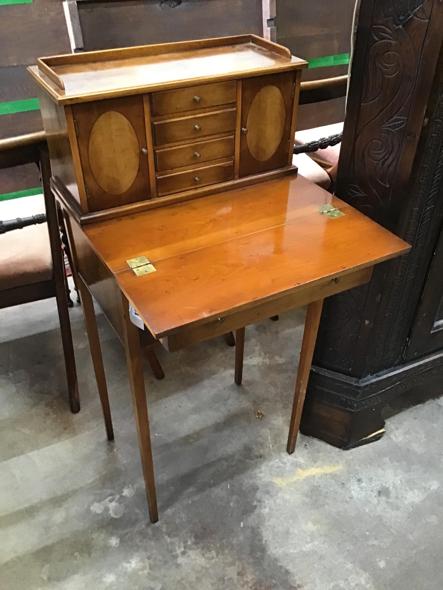 A small reproduction Sheraton style yew bonheur du jour width 48cm, depth 35cm, height 102cm.